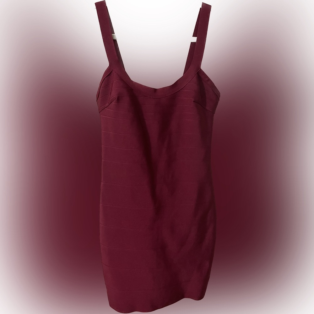 Dark red, sexy bodycon style mini dress. Size M. Purchased used but Never worn.